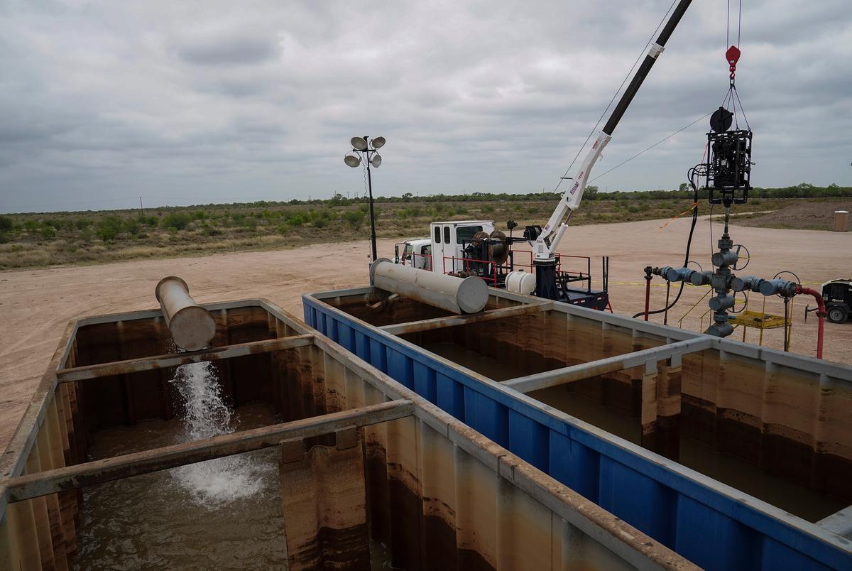 The water which is flow-back from the well, located to the right, is seen during a mechanical storage demonstration site on March 22, 2023 in Starr County Santa Elena, Texas. The startup is testing storing energy in the ground.
Verónica G. Cárdenas for The Texas Tribune